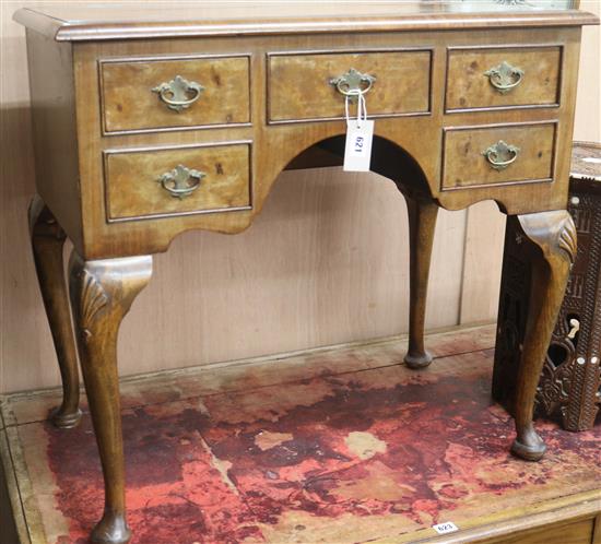 A walnut knee hole desk, W.78cm